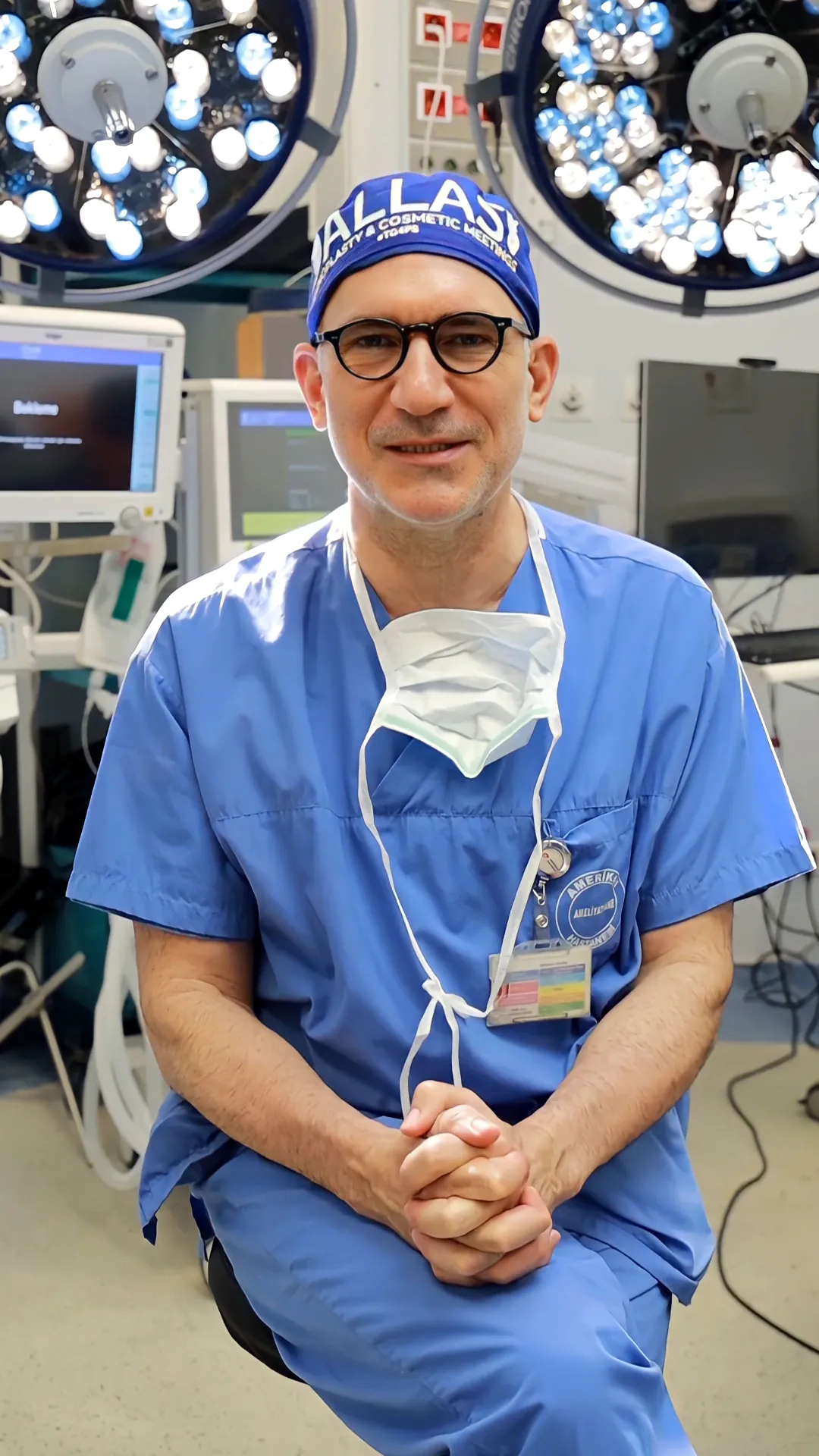 Dr. Teoman Dogan in surgical scrubs in the operating room